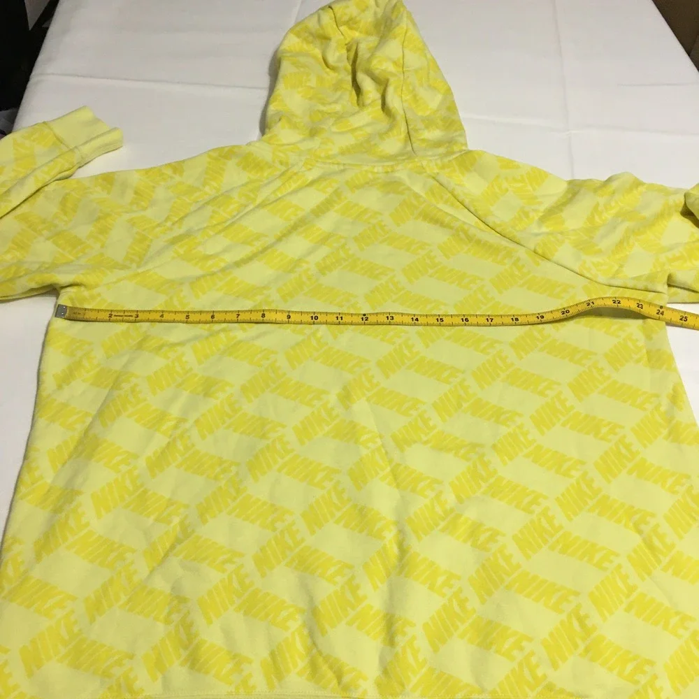 Nike Sportswear Essentials Pullover Hoodie Womens XL Yellow All Over Print Logo